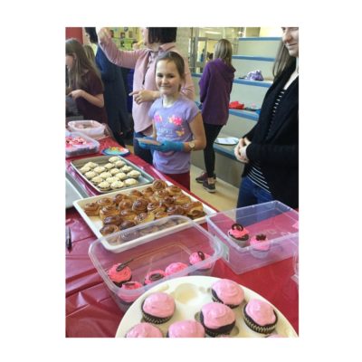 Students selling baking goods